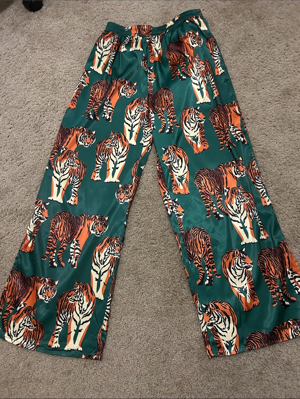 Dressed in LaLa tiger print wide leg silky pants with pockets size medium NWOT